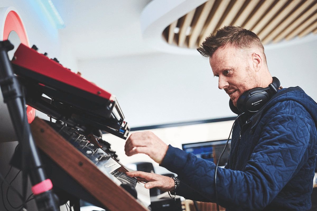 Timo Baker working in his home studio